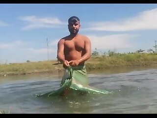 Desi taking a bath in the river